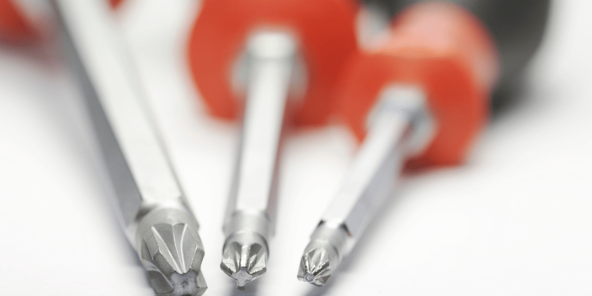 blurred close-up image of screwdriver heads