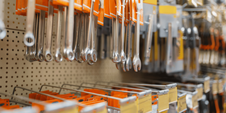 wrenches on a hardware shelf